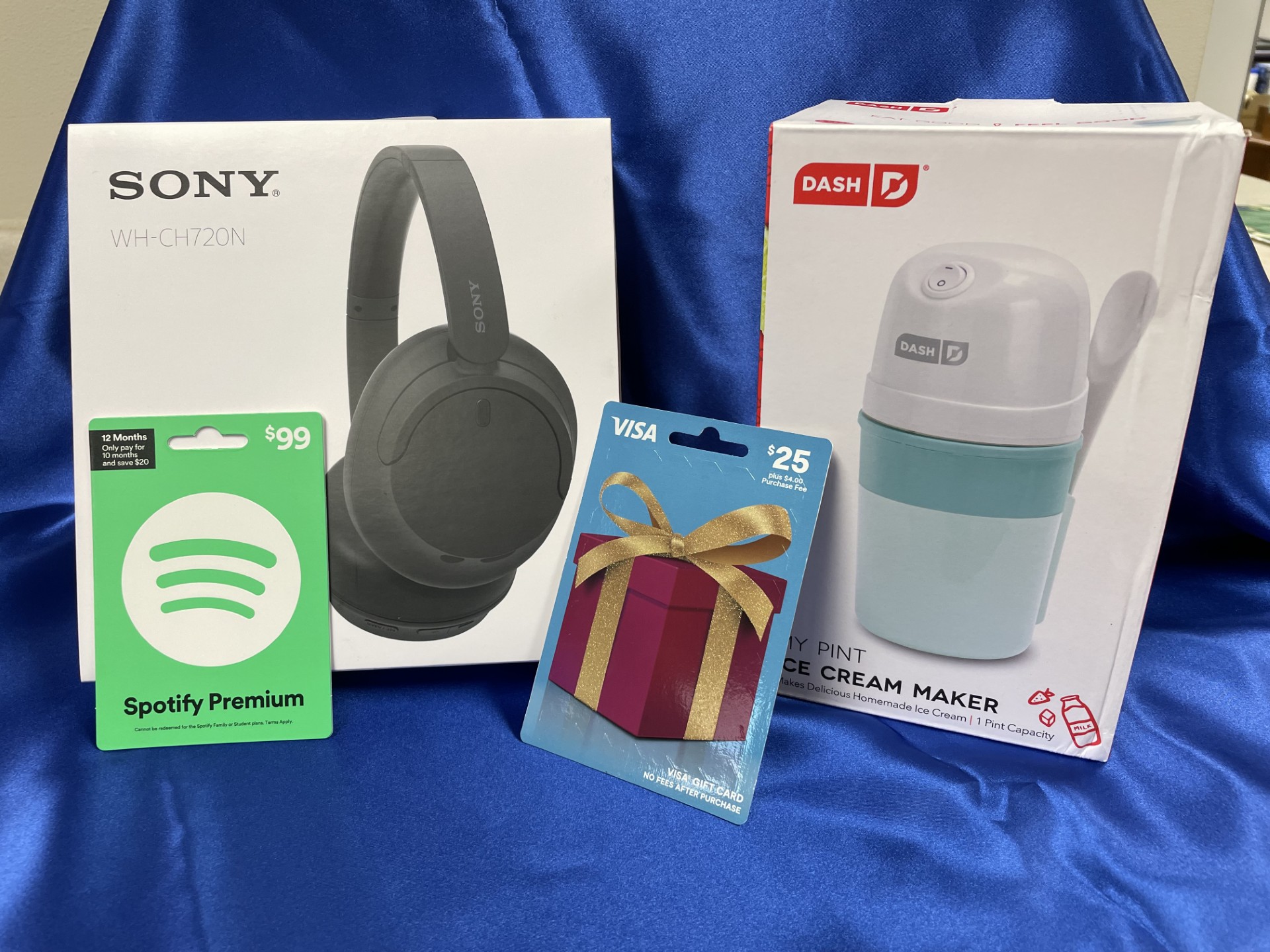 Spotify gift card, headphones, Visa gift card, ice cream maker